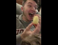 Guy chokes while spitting out apple 
