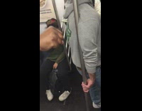 Collab Subway Creatures - Woman puts out fist at man and preaches on subway train