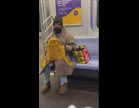 Lady wears black shut up everyone beanie 