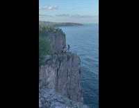 Woman angry to get proposed to in sweat pants on cliff 