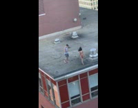 Rooftop pink bikini barefoot red building girl