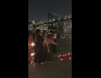 Engagement party lights up near bridge 