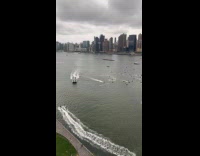 Lots of jet ski riders gather on river part 2