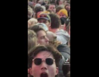 Camera compilation zooming into random peoples faces reaction