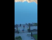 Girl black jacket cardio workout lake reflection