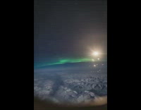 Person in plane recorded aurora borealis night
