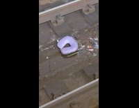 Submitter shows travel pillow thrown at tracks