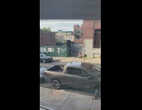 Girl uses rowing machine on sidewalk exercise 