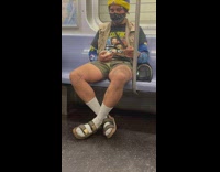 Guy strokes rodents tail on train 