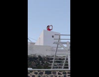 Girl red tank top photograph sunset santorini 