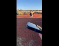 Collab IITW - Two people kangaroo jump at the sunset