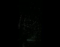 Guy in dark room filled with lights 