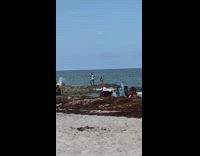 White shirt guy bikini girl squats pt. 2 
