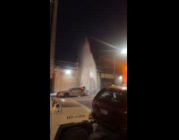 Water gush out high near frozen car