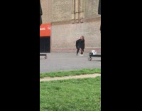 Two women black dress photo shoot spin