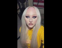 Girl orange shirt creepy contacts forehead gets bigger