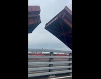 Filmer shows raised closed bridge overcast