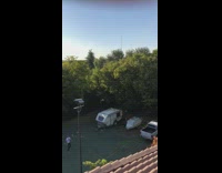 Guy on roof hits ball friend catches 