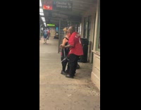 Couple in red and black dance to latin music