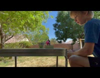 Little brother shoots ball on the cup