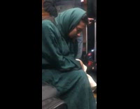 Woman falling asleep on bumpy subway train