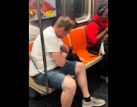 Collab WINY - Man on subway train with two pet rabbits white black