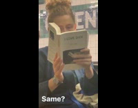 Woman reads book called I love dick on subway train