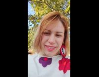 Gray dog run on grass carry football longer version