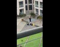 Girl black sleeves lay on ground apartments