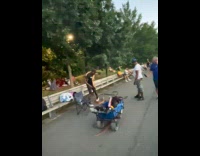 Collab WINY - Man lay down pet snakes on ground