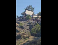 Woman leg split bend over on mountain