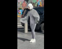 Woman wears illusion costume pose for photoshoot 