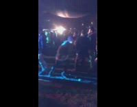 MUSiC Green Sweater Kid Runs at Music Festival and Tackles Kid in Chair