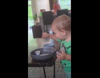 Toddler tries sweet and sour sauce 