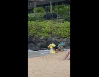 Two woman mermaid tail lay on beach