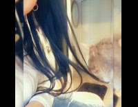 Lady thanks cat for brushing and combing her hair 