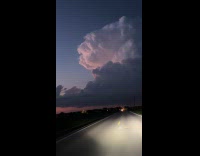 Filmer drive car show storm clouds with lightning