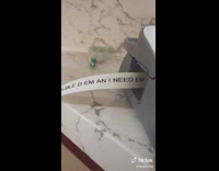 Person prints lyrics on sticker 