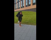 Guy throws shoe lands on tall lamppost 