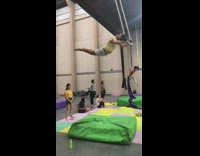 Guy tries to swing off of bar fail 