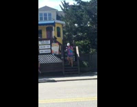 girl in pink wearing blue life vest