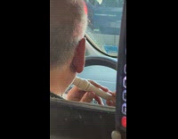 Taxi driver plate flute wait for traffic 