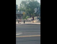 Man red hoodie jacket dance Horse statue