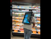 Man screen bag plays cartoon inside store