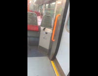 Man on bus shoots tissue on trash bin