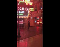 Neon lights museum black shirt girl red