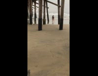 Black bathing suit girl splits beach bridge 