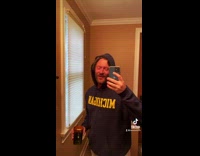 Guy shows his progress through the mirror 