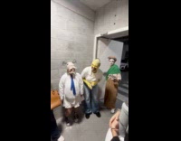 Women funny Halloween costumes at fire exit