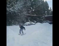 Guy backflips on skis off ramp and lands on head in the snow